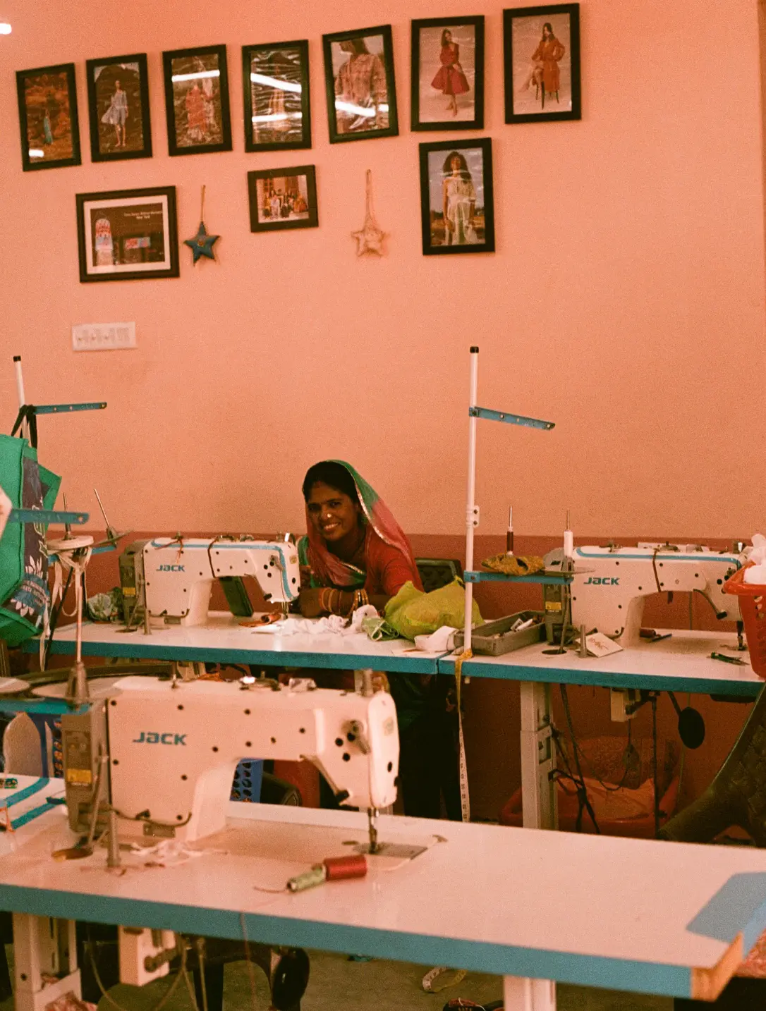 A Saheli seamstress at her sewing machine in the centre