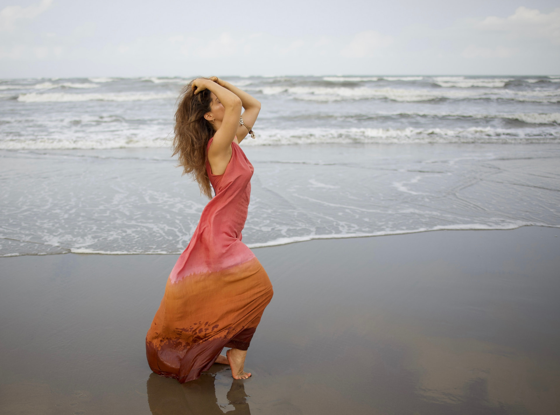 Aphrodite mulberry silk dress in pink and rust ombre at the shoreline