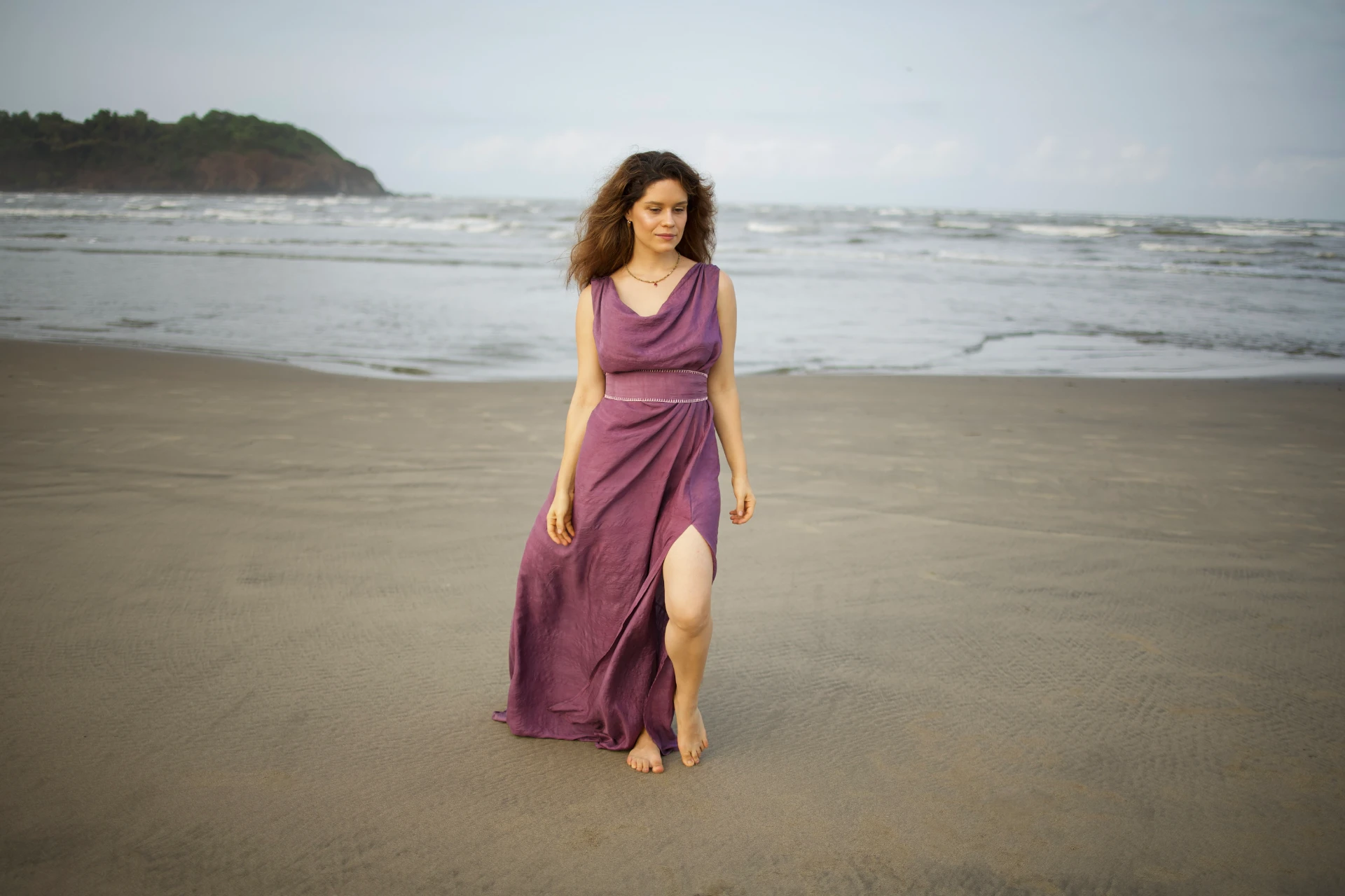 Hera dress in deep purple mulberry silk on the beach